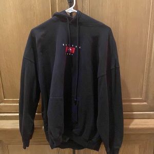 Brandy Melville, black sweatshirt that says suisse